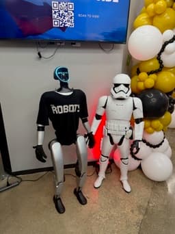 The Capital Factory robot mascot meets a stormtrooper
