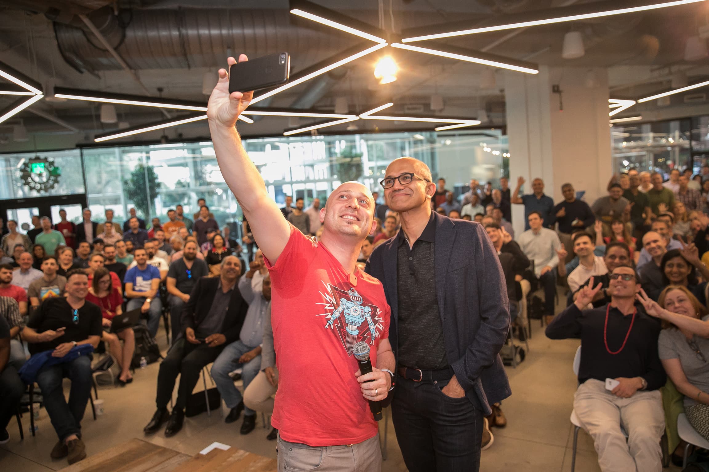 Microsoft CEO Satya Nadella takes a selfie with the Capital Factory crowd